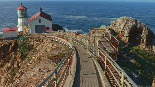 Iconic Point Reyes Lighthouse in California overlooking the Pacific Ocean. A historic landmark surrounded by dramatic coastal views, perfect for nature lovers, photographers, and travelers seeking bre