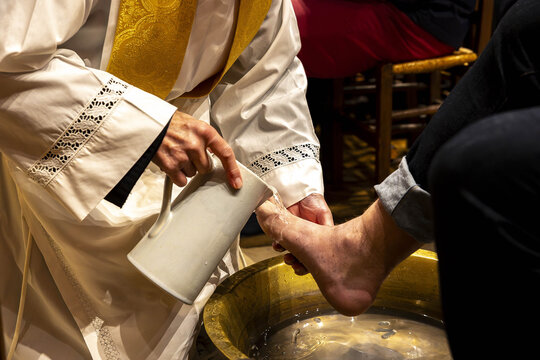 Maundy Thursday celebration in Saint Philippe du Roule catholic church, Paris, France. Foot washing ceremony