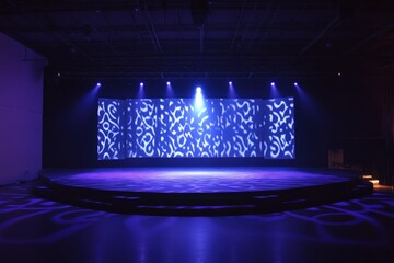 Dramatic stage lighting with gobo patterns illuminating an empty burlesque stage, creating an elegant and artistic ambiance for performances.