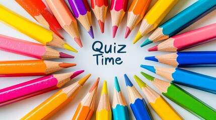 Fototapeta premium A lively display features an array of colored pencils arranged in a circular pattern, encircling the cheerful words quiz time in the center, inviting creativity and fun