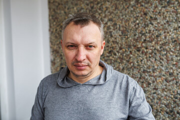 distorted face of sad and grieved very upset person, dissatisfied with his hard fate