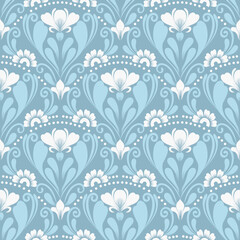 Seamless folk art floral pattern with symmetrical decorative motive. There are beautiful decorative elements. This vector illustration is perfect for branding, packaging, invitations, and textile desi