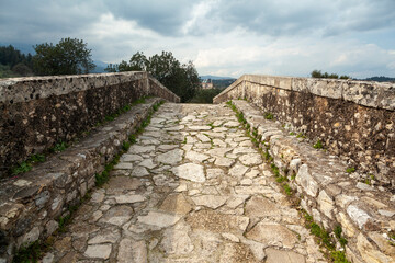 A historic stone bridge in Apokoronas, Chania, Crete. This timeless pathway, rich in history and charm, connects past and present through its stones