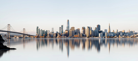 the skyline of san francisco during sunrise
