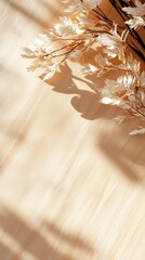Obraz premium Delicate shadow play of dried leaves on warm wooden surface indoor still life serene atmosphere