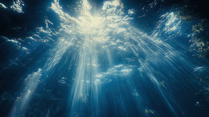 Fototapeta premium Ethereal Rays of Light Penetrating the Deep Ocean Serenity