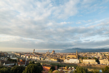 Fototapeta premium View of Florence Cathedral (Cattedrale di Santa Maria del Fiore) and rest of Florence from Michelangelo plaza. Panoramic view of Florence, Tuscany, Italy