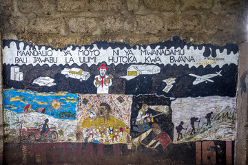 Fototapeta premium Scriptures painted and illustrated on a wall in Arusha, Tanzania