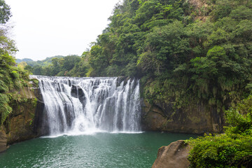 Naklejka premium Scenic Taiwan Shifen waterfall with cascading waters