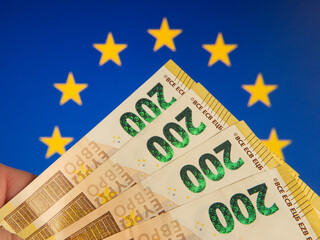 European Currency Notes with European Union Flag Background