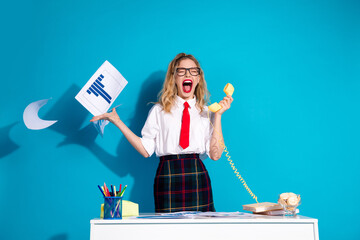 Woman in school uniform yelling on phone surrounded by documents in blue background