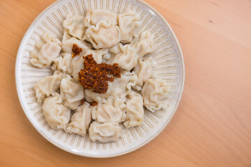 Tasty Chinese Meat Dumpling with Dipping Sauce for Meal