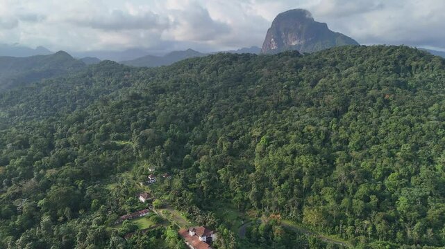 Sao Tome and Principe - Aerial View of Pico Maria Fernandes. Majestic Volcanic Mountain Rising Above Dense Tropical Rainforest Near Angolares.