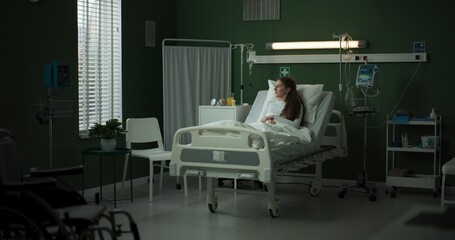 Doctor enters the room with a tablet, ready to review the patient's progress.