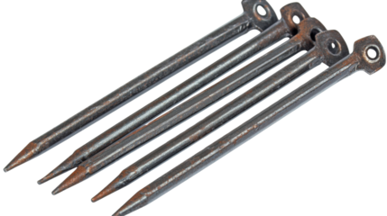 Five rusty tent pegs lying on transparent background