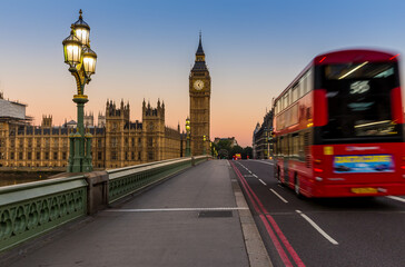 Big Ben and red bus in London at sunrise, UK
