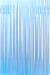 Obraz premium Abstract background with reeded ribbed glass effect texture