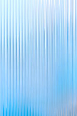 Fototapeta premium Abstract background with reeded ribbed glass effect texture
