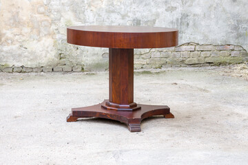 Old vintage antique round circular table with clipping path for isolation