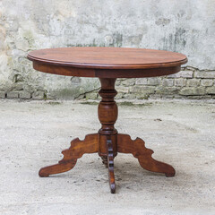 Old vintage antique round circular table with clipping path for isolation