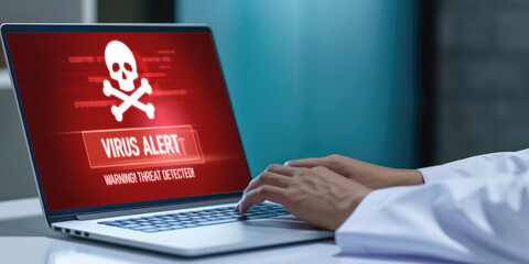 Virus warning alert on computer screen detected brisk cyber threat , hacker, computer virus and malware