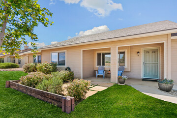 the front view of a home with a yard