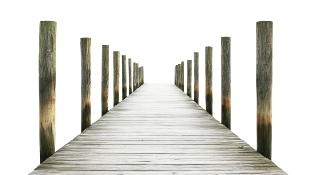 Wooden pier extending into transparent background with supporting pillars
