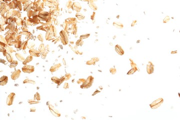 Close-up of dry oatmeal against white background, ideal for food or cereal industry marketing