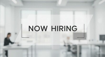 Modern office interior with hiring notice in focus