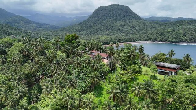 Sao Tome and Principe - Angra Toldo Praia and Pico Maria Fernandes. Scenic Small Town Surrounded by Tropical Rainforest and Majestic Mountains.