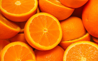 Close up of freshly cut half oranges