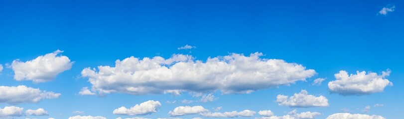 Cumulus clouds against blue sky, Marion County, Illinois.