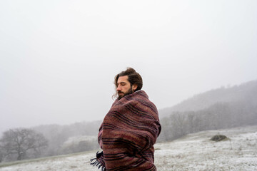 man in winter forest