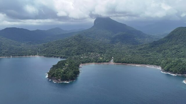 Sao Tome and Principe - Angra Toldo Praia and Pico Maria Fernandes. Scenic Small Town Surrounded by Tropical Rainforest and Majestic Mountains.