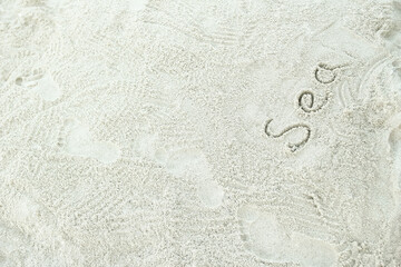 beautiful pattern on the sea sand on nature background