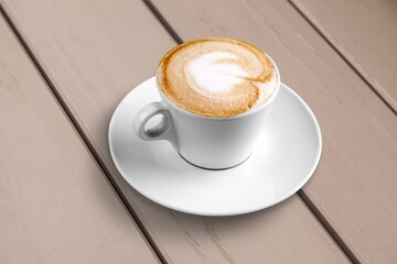 Tasty hot Espresso coffee in cup on desk