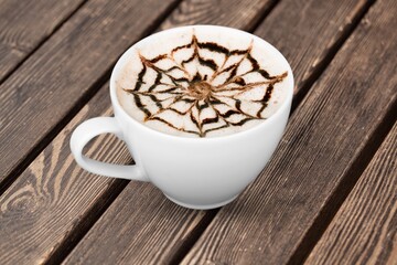 Tasty hot Espresso coffee in cup on desk