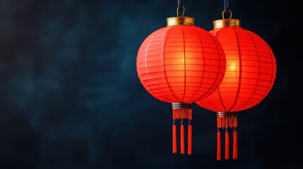 Obraz premium Vibrant Red Lanterns Hanging in the Dark Background