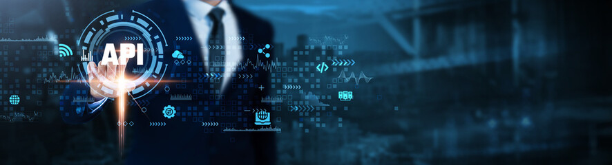 API (Application Programming Interface): Integration, connectivity, data exchange, automation, software development, interoperability, scalability, Businessman analyzes real-time technological data.