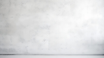 A white wall with a few spots and a few cracks