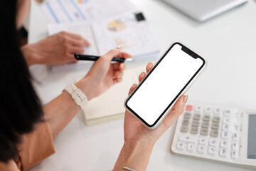 phone in girl's hand that is being used for work