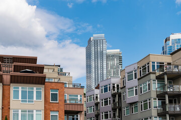Fototapeta premium Modern city skyline. Cityscape with business building. Skyscraper cityscape of metropolitan city architecture. Business district. Cityscape with skyscraper architecture. Residential condominium