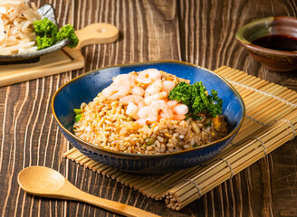 Shrimp Fried Rice with broccoli served in bowl isolated on wooden background side view of taiwan food