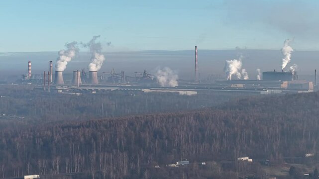 Poland - Aerial View of ArcelorMittal Steel Plant in Dąbrowa G&oacute;rnicza. Industrial Landscape With Smokestacks and Emissions.