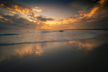 Fototapeta premium USA, New Jersey, Cape May National Seashore. Sunset on ocean and shore.