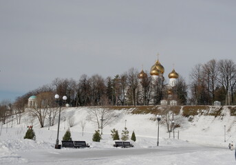 Volzhskaya embankment. Walking area of ​​Yaroslavl. Golden domes of the Assumption Cathedral