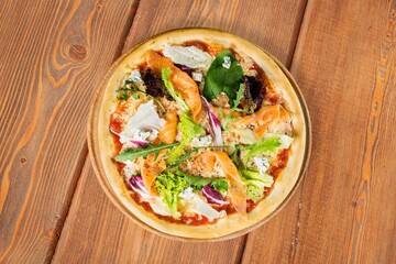 Delicious fresh hot pizza on wooden table