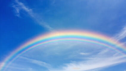 Rainbow in the blue sky