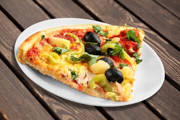 Delicious fresh hot pizza on wooden table