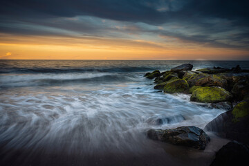 USA, New Jersey, Cape May National Seashore. Sunrise on ocean shore.